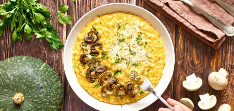 Pompoen Risotto met champignons als topping
